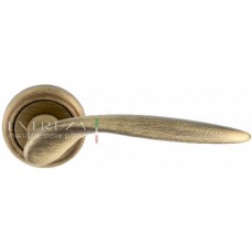 Ручка дверная на круглой розетке Extreza "CALIPSO" (Калипсо) 311  R01 Бронза матовая F03