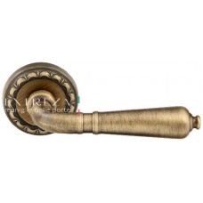 Ручка дверная на круглой розетке Extreza "PETRA" (Петра) 304  R02 Бронза матовая F03