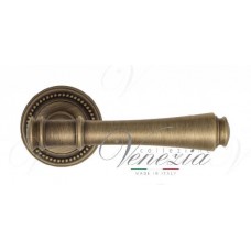 Ручка дверная на круглой розетке Venezia Callisto D3 Бронза матовая